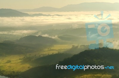 Landscape Of Mountain With The Clouds And Fog Stock Photo