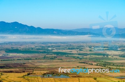 Landscape Of Mountain With The Clouds And Fog Stock Photo