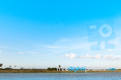 Landscape Of Water Canal With Blue Sky And Clouds Stock Photo