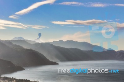 Landscape View At The Volcanic Mountains Over Lake Atitlan In Gu… Stock Photo