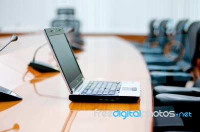 Laptop In Meeting Room Stock Photo