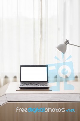 Laptop In Room Stock Photo