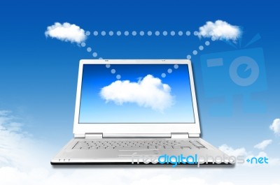 Laptop On The Cloud Stock Photo