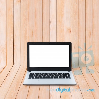 Laptop On Wood Background Stock Photo