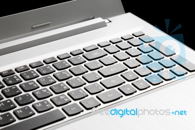 Laptop Or Notebook Button On Black Background Stock Photo