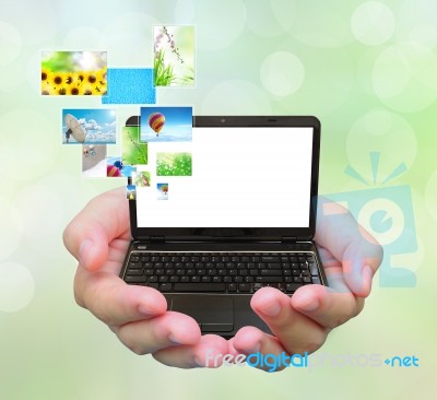 Laptop Pc On Women Hand Stock Photo