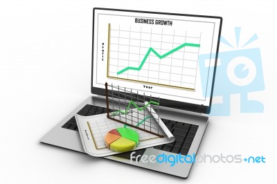 Laptop Showing A Spreadsheet And A Paper With Statistic Charts Stock Image