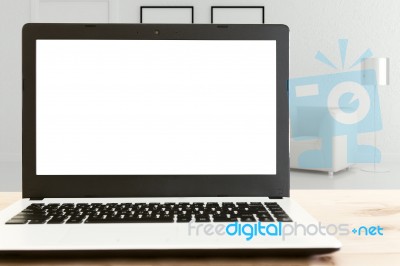 Laptop White Screen On Wood Desk Stock Photo