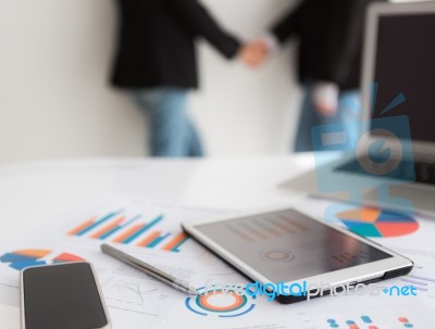 Laptop With Tablet And Smart Phone On Table Stock Photo