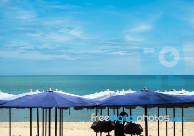 Large Umbrella At Cha-am Beach Stock Photo