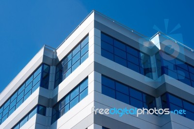 Large Windows Of The New Building As A Geometric Pattern Stock Photo