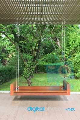 Large Wooden Swing Stock Photo