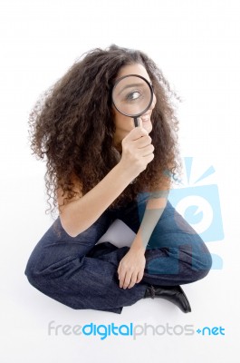 Latin American Female Holding Magnifier Stock Photo