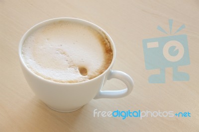 Latte Coffee On Light Wooden Table Stock Photo