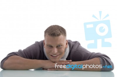 Laying Handsome Male Looking At Camera Stock Photo