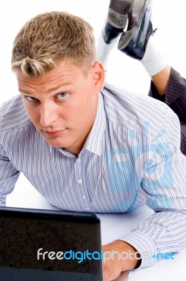 Laying Man With Notebook Stock Photo