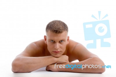 Laying Muscular Male Looking At You Stock Photo