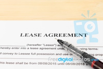 Lease Agreement Contract Document And Pen Horizontal View Stock Photo