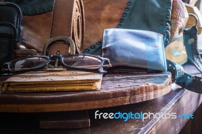 Leather And Accessories On A  Table Stock Photo