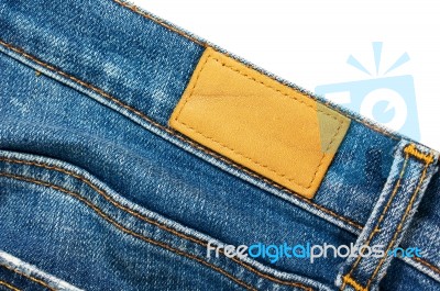 Leather Label On Blue Jeans Stock Photo