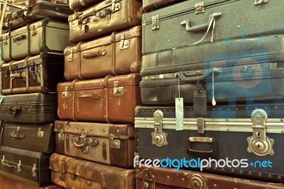 Leather Suitcases Stacked Stock Photo