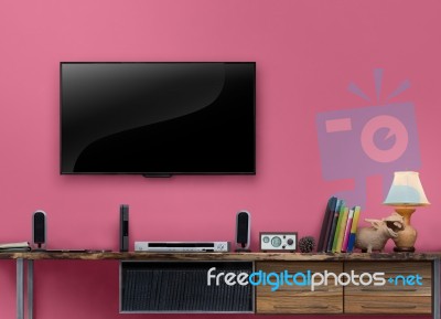 Led Tv On Concrete Wall With Wooden Furniture In Living Room Stock Photo