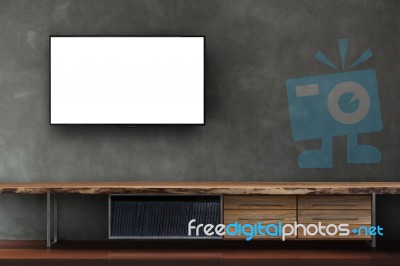 Led Tv On Concrete Wall With Wooden Furniture In Living Room Stock Photo