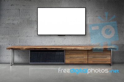 Led Tv On Concrete Wall With Wooden Furniture In Living Room Stock Photo