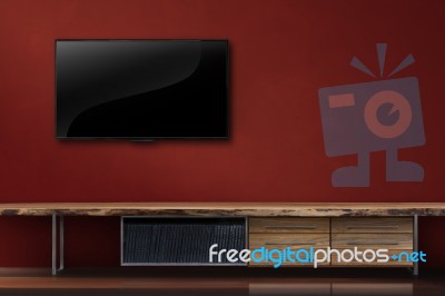 Led Tv On Concrete Wall With Wooden Furniture In Living Room Stock Photo