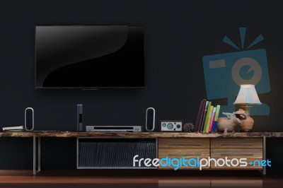 Led Tv On Concrete Wall With Wooden Furniture In Living Room Stock Photo