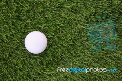 Left Golf On Green Grass Field Stock Photo