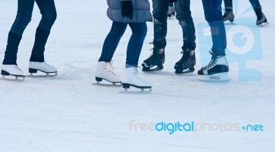 Legs Of People Skating Closeup Stock Photo