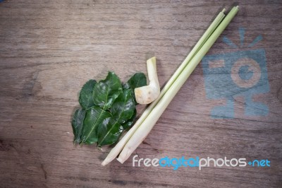 Lemon Grass,galangal,kaffir Lime Leaves. Thai Traditional Spicy Soup Ingredients On Wood Background Stock Photo