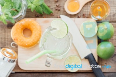 Lemonade In Glass On Wood Table Stock Photo