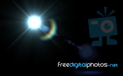 Lens Flare Light Over Black Background. Easy To Add Overlay Or S… Stock Image