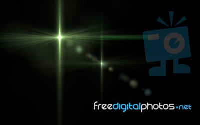 Lens Flare Light Over Black Background. Easy To Add Overlay Or Screen Filter Over Photos Stock Image