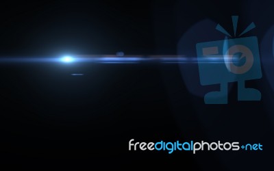 Lens Flare Light Over Black Background Horizontal Stock Image