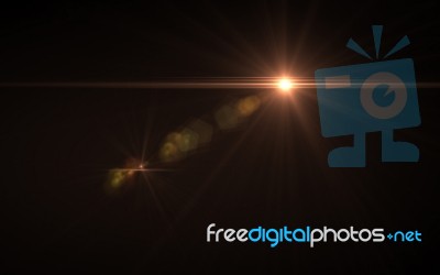 Lens Flare Light Over Black Background Horizontal Stock Image