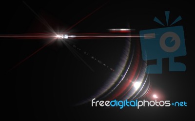 Lens Flare Or Star Flare In Black Background.modern Nature Flare Effect With Black Background For Overlay Design Stock Image