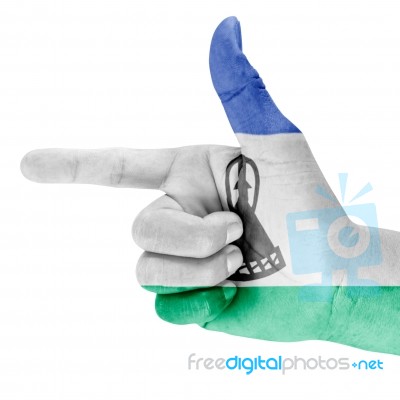 Lesotho Flag On Shooting Hand Stock Photo