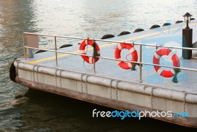 Life Preserver And Pontoon Stock Photo