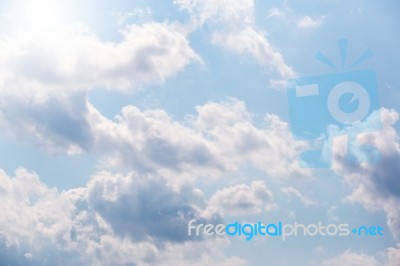 Light Blue Sky With White Close-up Clouds Stock Photo