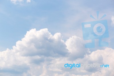 Light Blue Sky With White Close-up Clouds Stock Photo