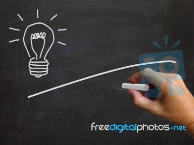 Light Bulb And Blackboard Copyspace Shows Ideas And Blank Vision… Stock Image