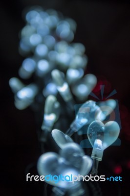 Light Bulb In The Shape Of Heart Stock Photo