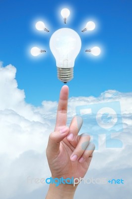 Light Bulb In Women Hand Stock Photo