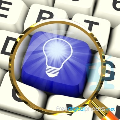 Light Bulb Key Magnified Means Bright Idea Innovation Or Inventi… Stock Image