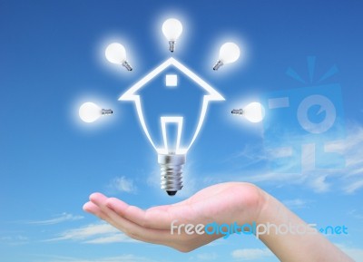 Light Bulb Model Of A House Stock Photo