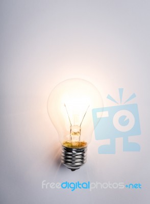 Light Bulb With Drawing Graph Stock Photo