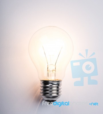 Light Bulb With Drawing Graph Stock Photo